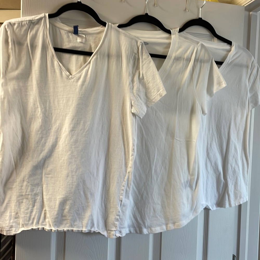 Three medium v-neck white tee’s